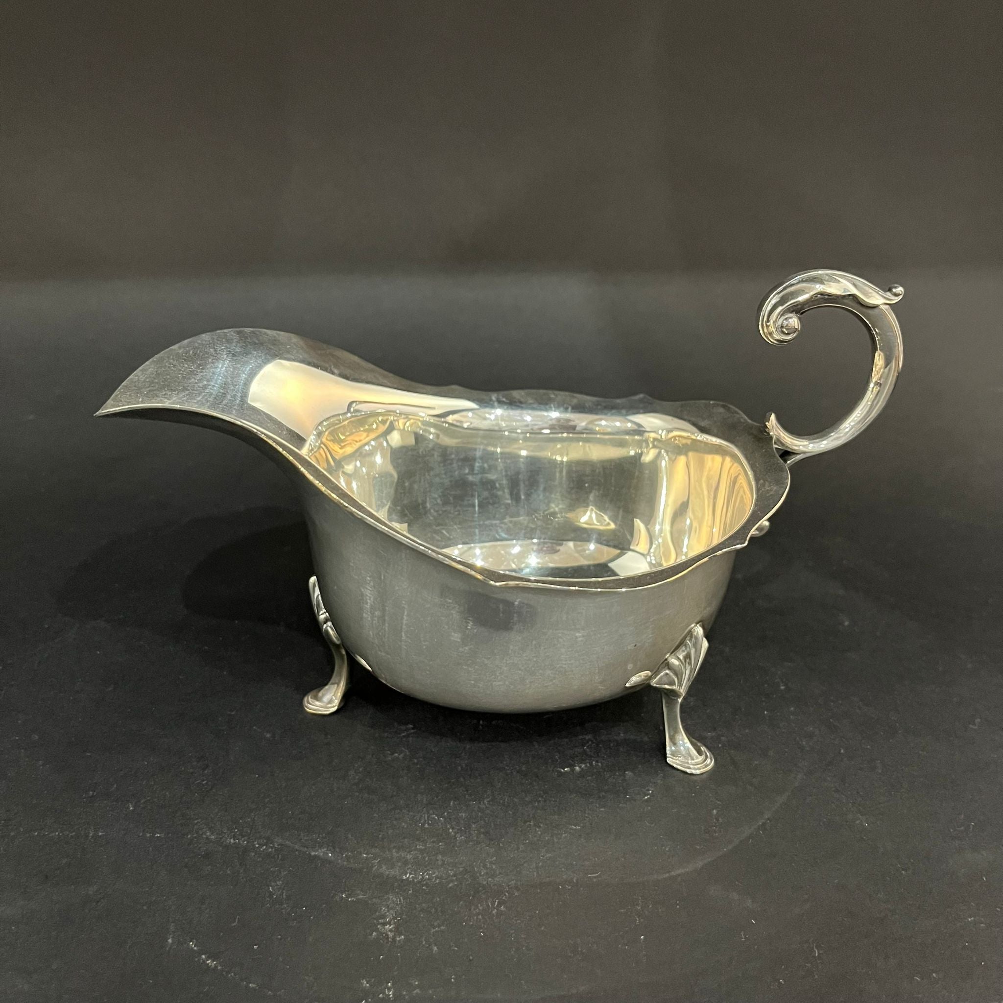 large silver sauce boat