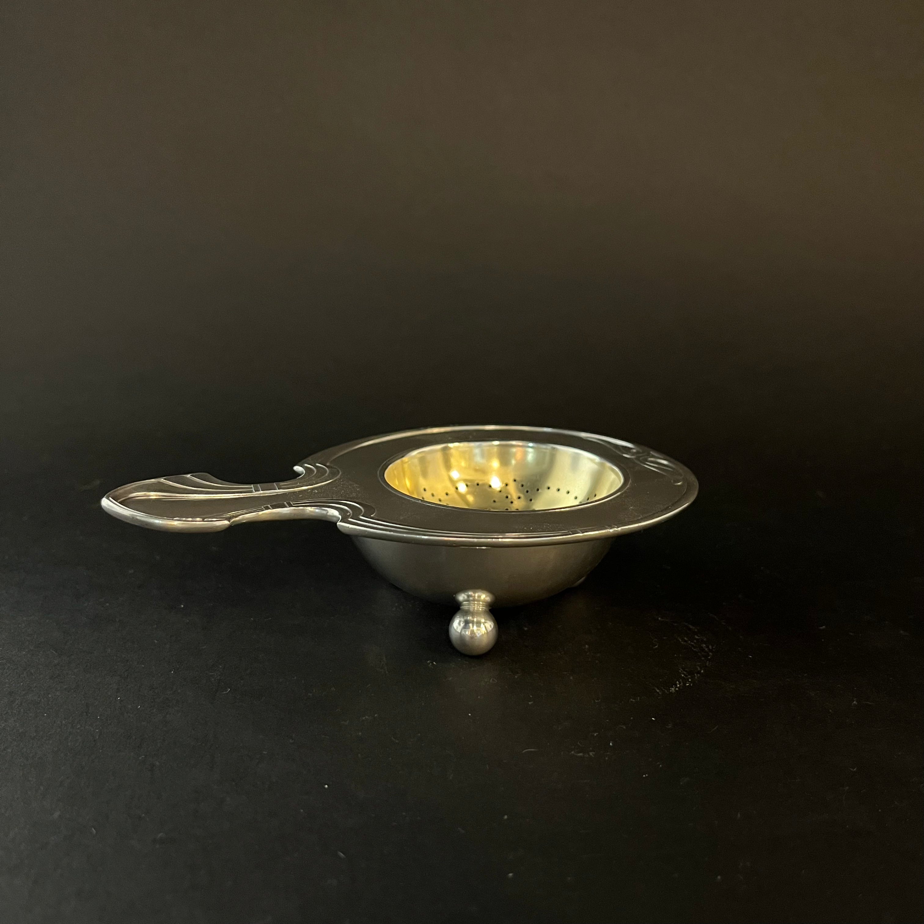 german silver gilt tea strainer and bowl