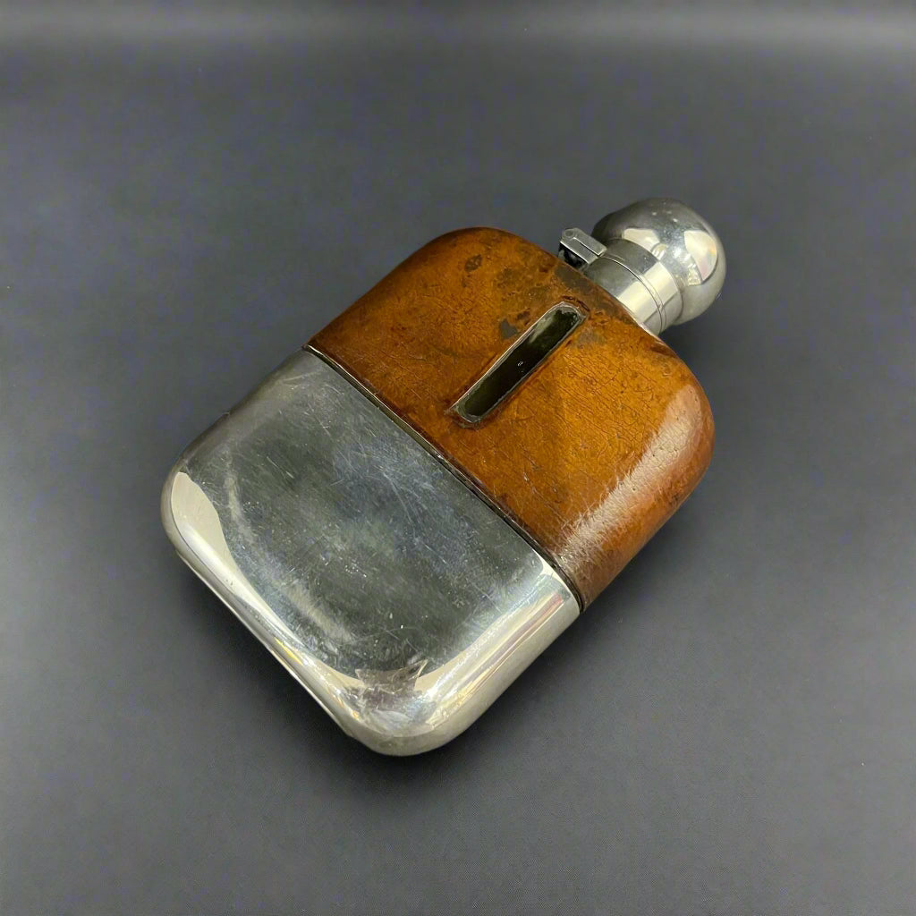 Silver and glass hip flask with leather upper made in Sheffield in 1940 by James Dixon and Son