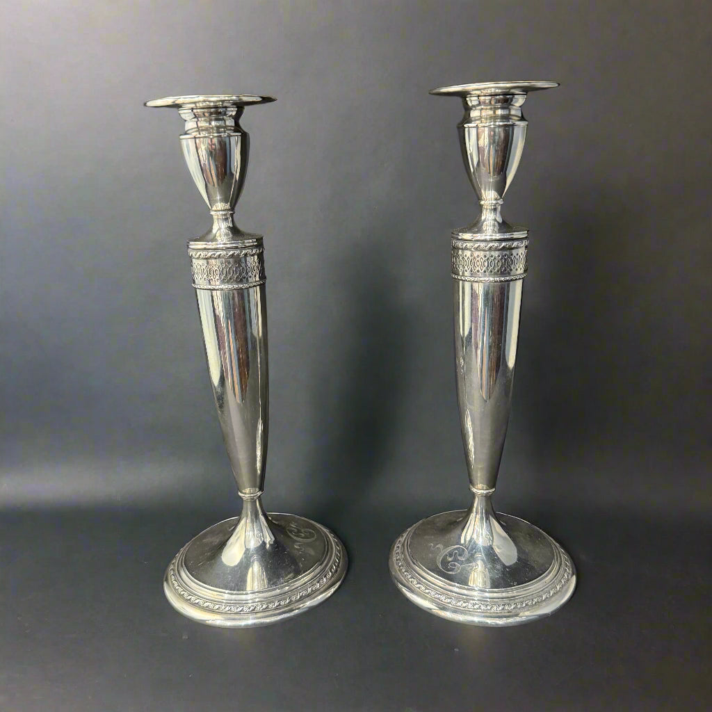 pair of silver candlesticks