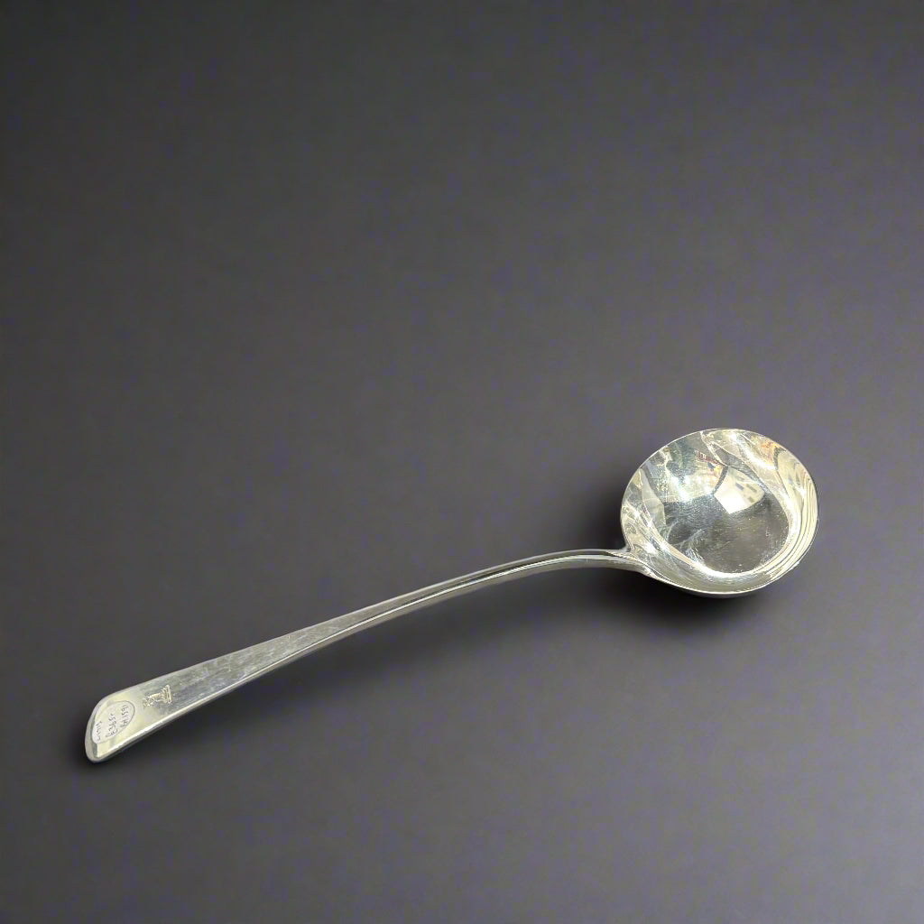 Heavy silver soup ladle made in London in 1913 by DJ Wellby