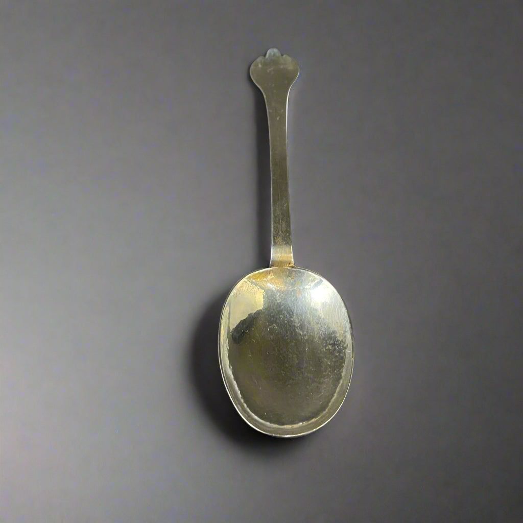 Typical silver trefid form spoon with rat tail on the reverse of the bowl. Engraved with initials TS made in London 1680 by John Smith