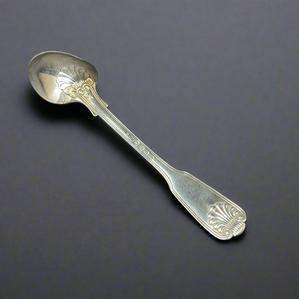 Silver fiddle, thread and shell dessert spoon made in London 1818 by Paul Storr