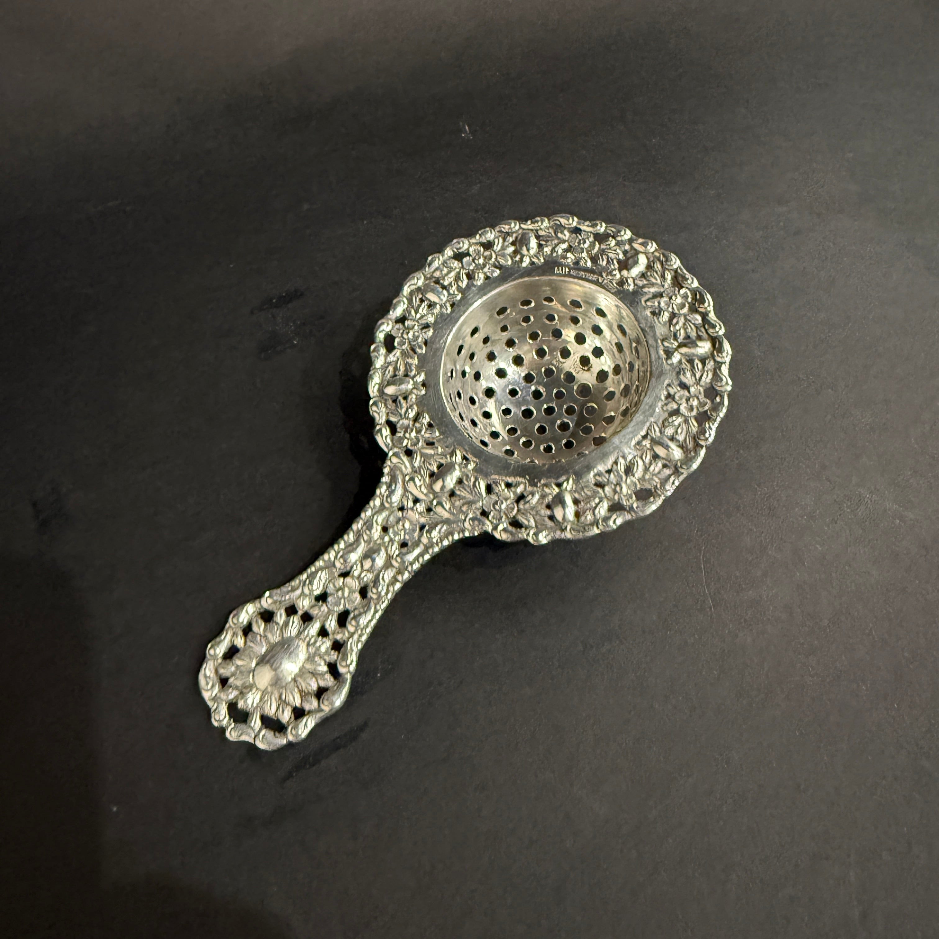 Silver tea strainer made in Holland circa 1880