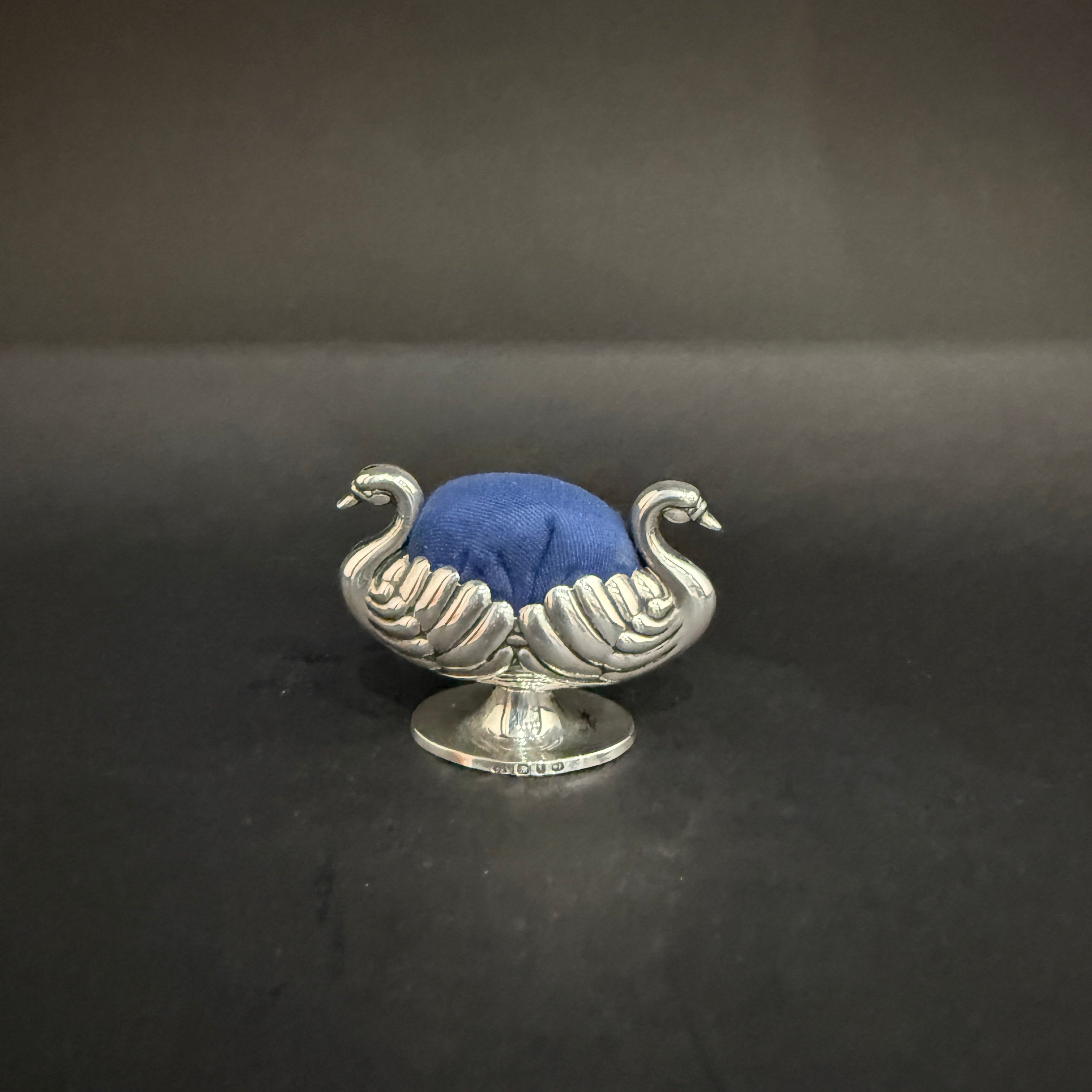 Double-headed silver swan pin cushion made in Birmingham 1897