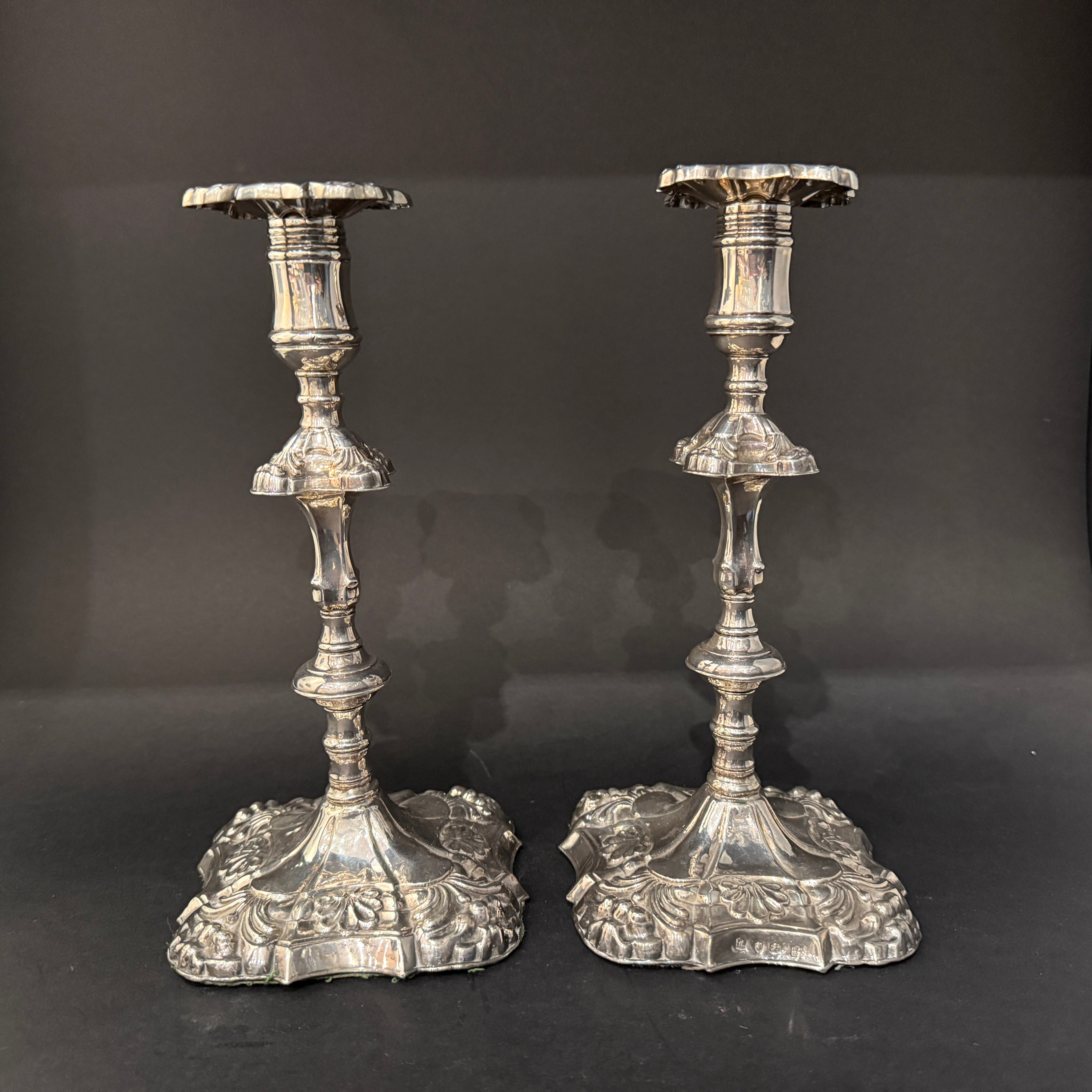 Pair of silver candlesticks made in London 1766 by James Stamp and John Baker