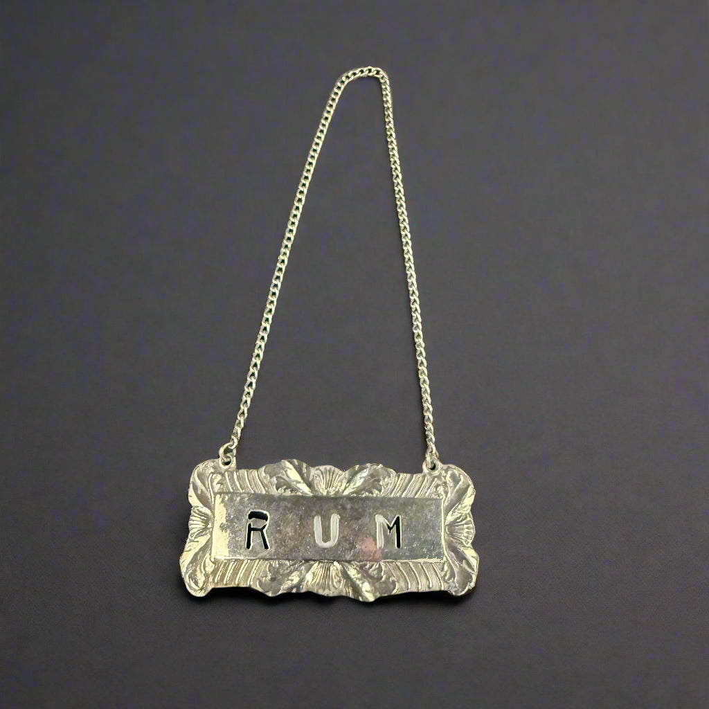 Modern silver rum decanter label 