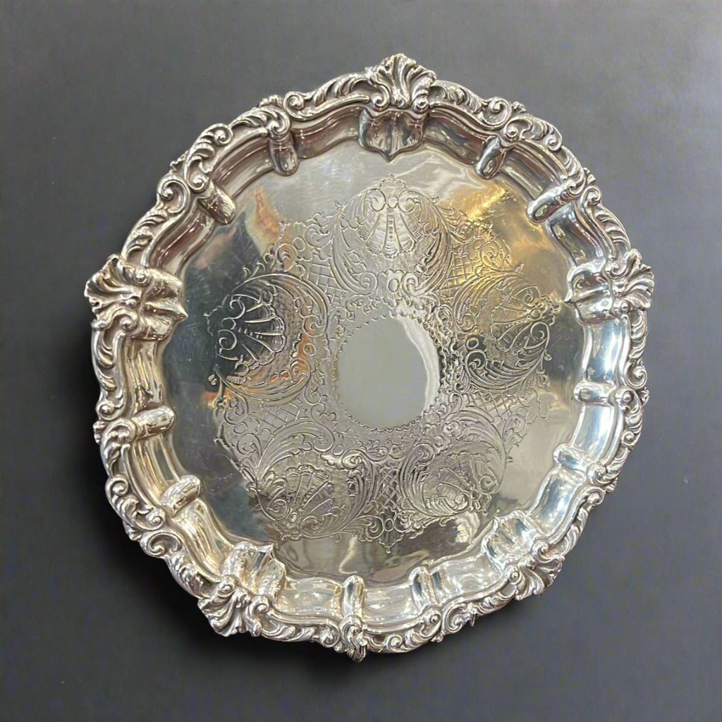 Silver salver with engraved decoration and cast and applied edge made in Sheffield 1942 by Roberts & Belk