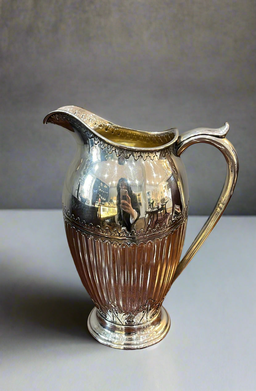 Silver water jug made in London 1882 by John Arkwinkle and James Slater