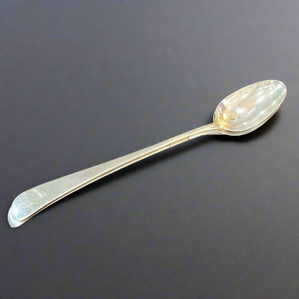 Pair of Georgian silver basting spoons made in London