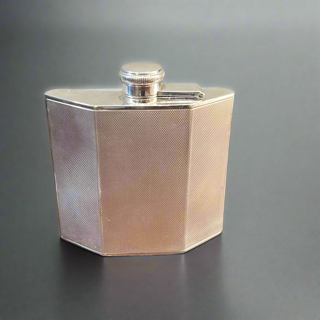 angular machine turned silver hip flask