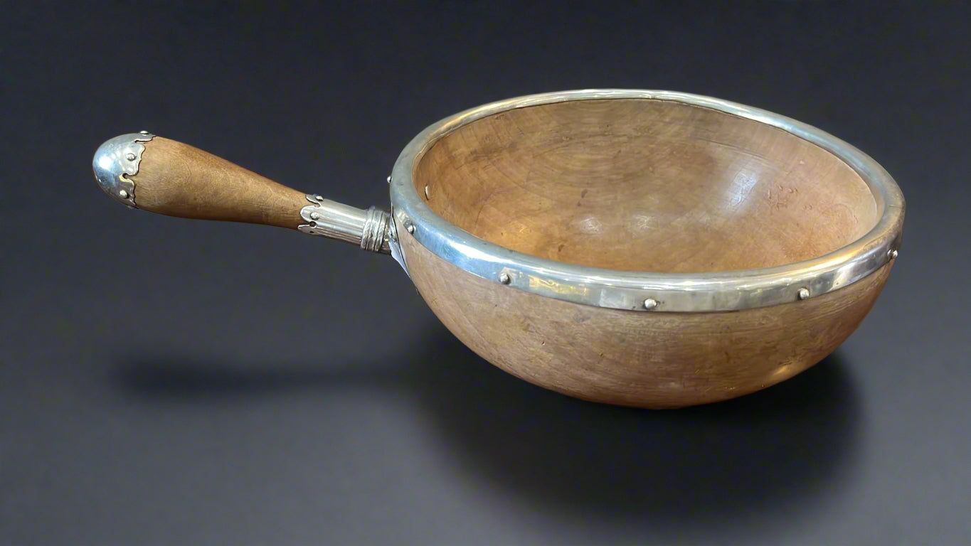 silver topped wooden bowl