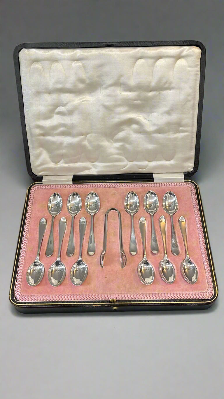 antique boxed set of silver teaspoons and sugar tong