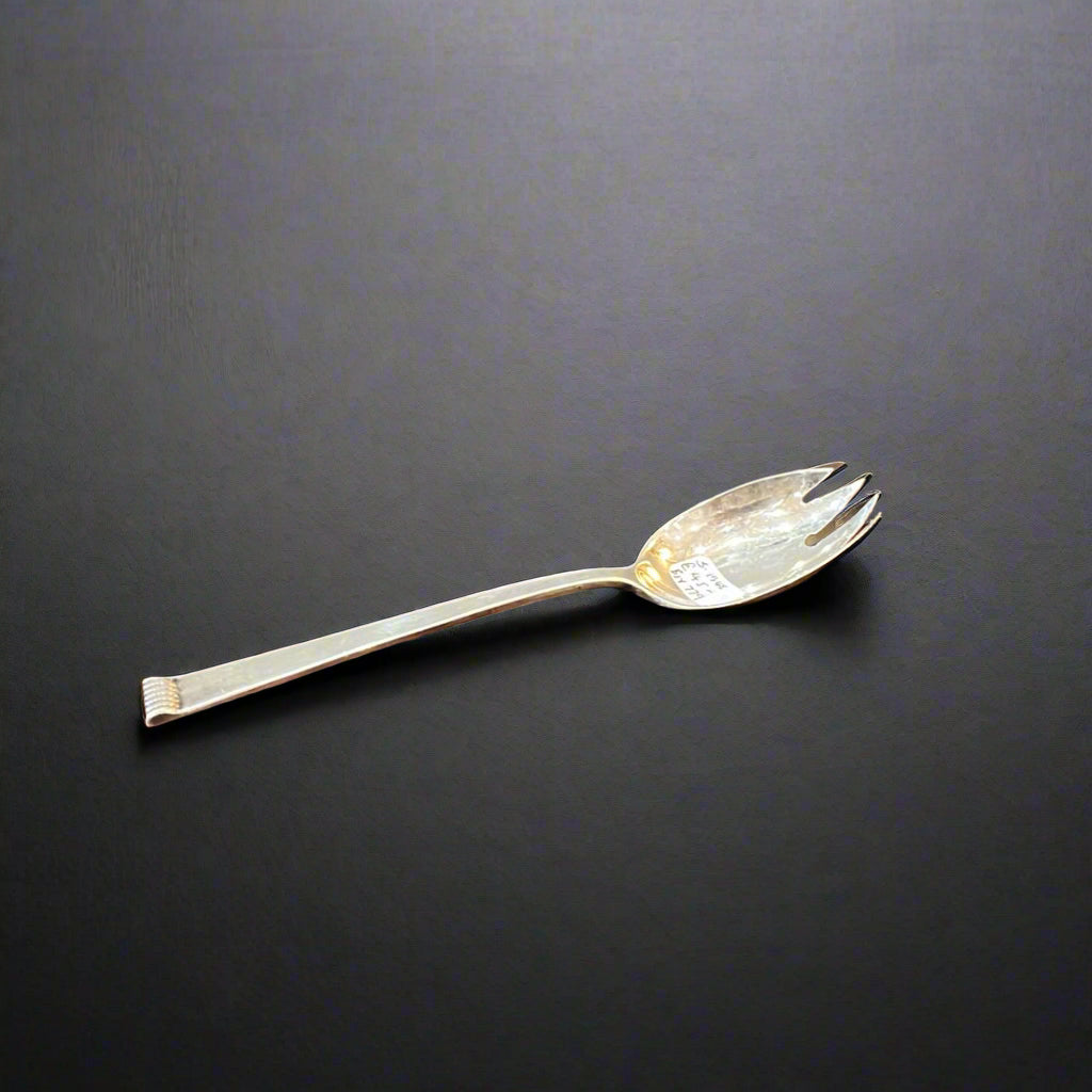 Small silver charcuterie fork made in Sheffield 1948