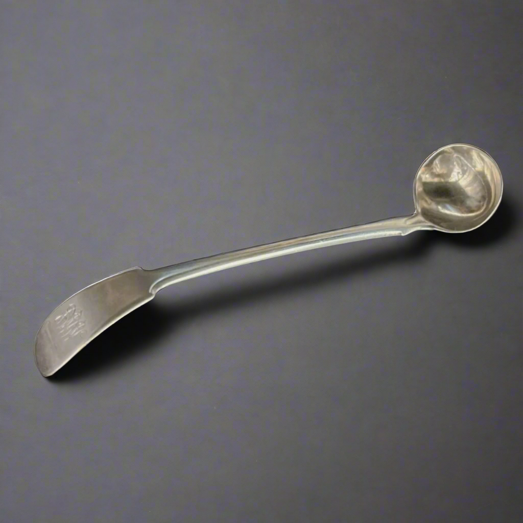 ⁠Large silver and gilt mustard spoon made in London 1823 by Thomas Baker