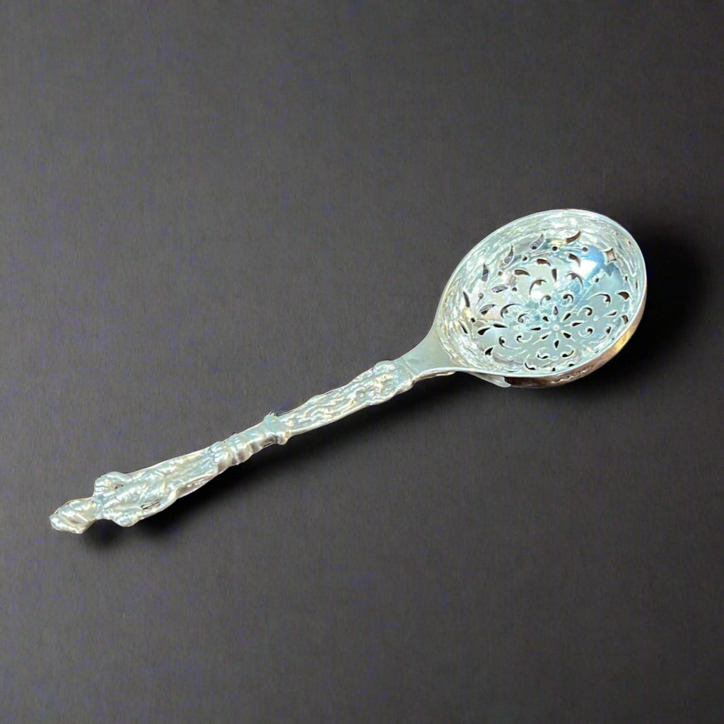 silver sugar sifting spoon