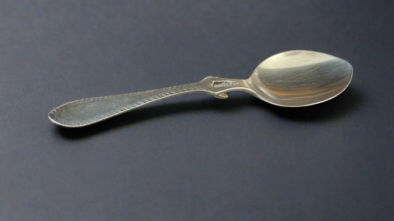 Silver jam spoon with hook made in Sheffield 1927