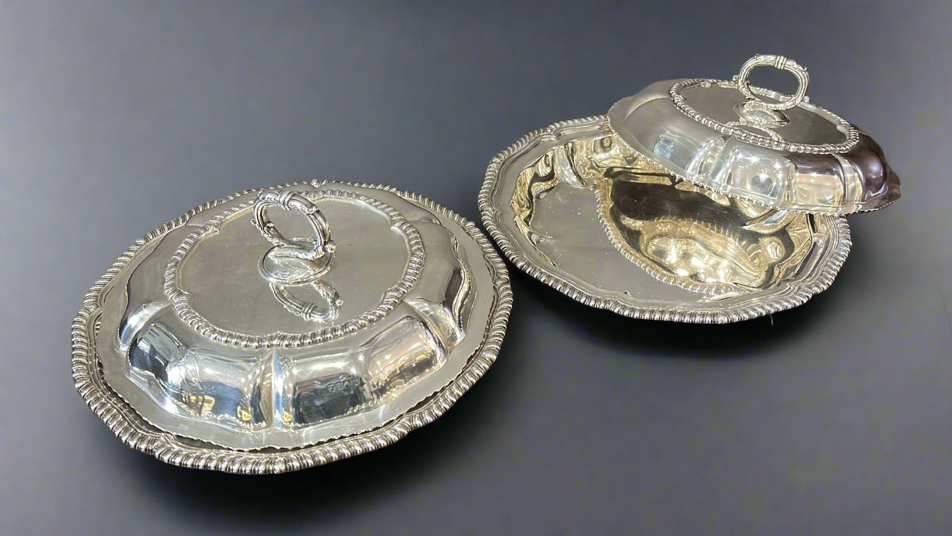 Pair of Garrard's silver serving dishes with lids