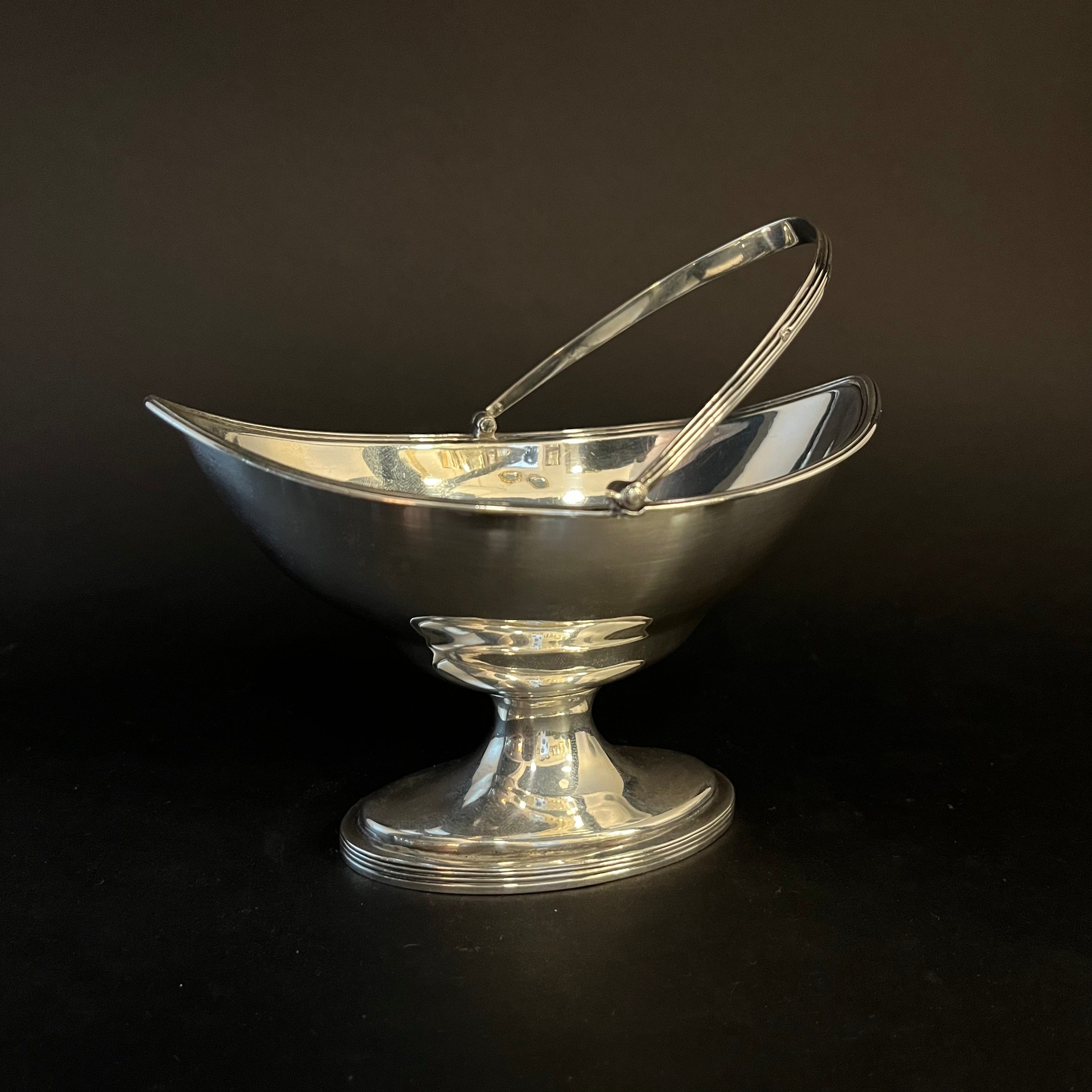 Plain silver swing handle sugar basket 1790 by Hester Bateman