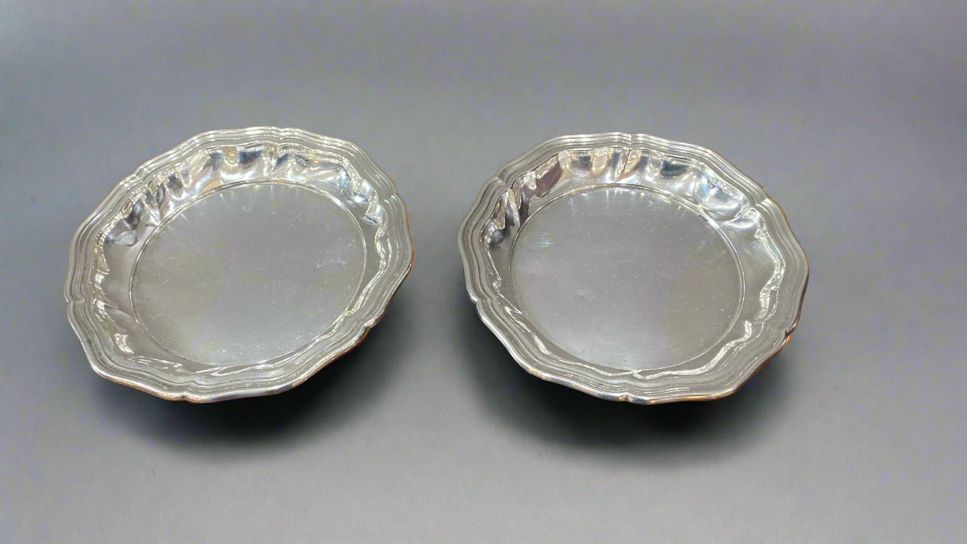 pair of german silver saucers