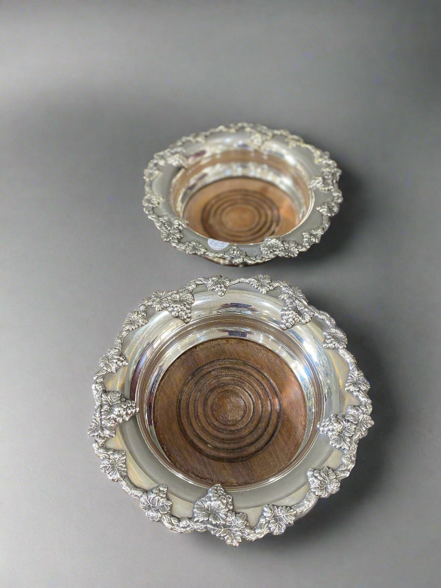 pair of silver plate wine coasters