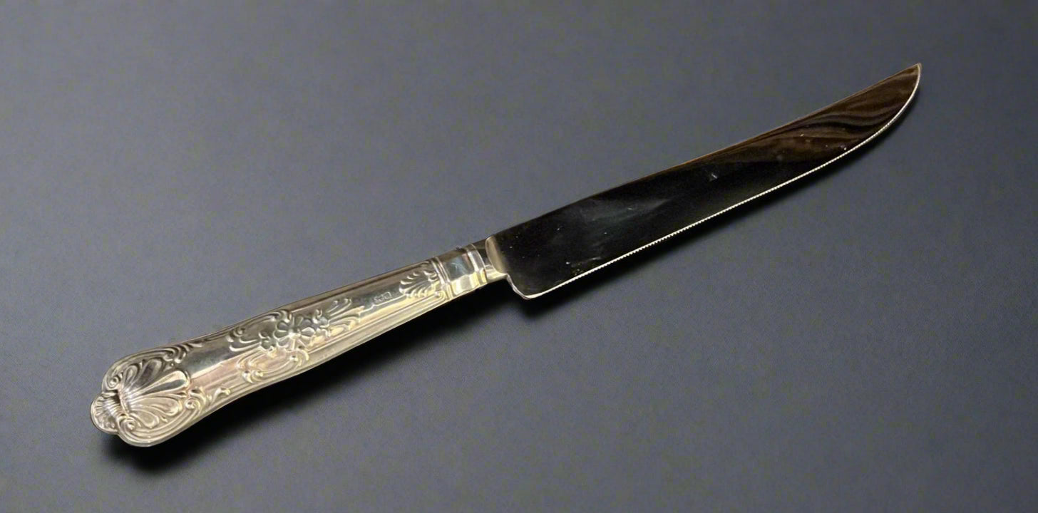 silver handled cake knife