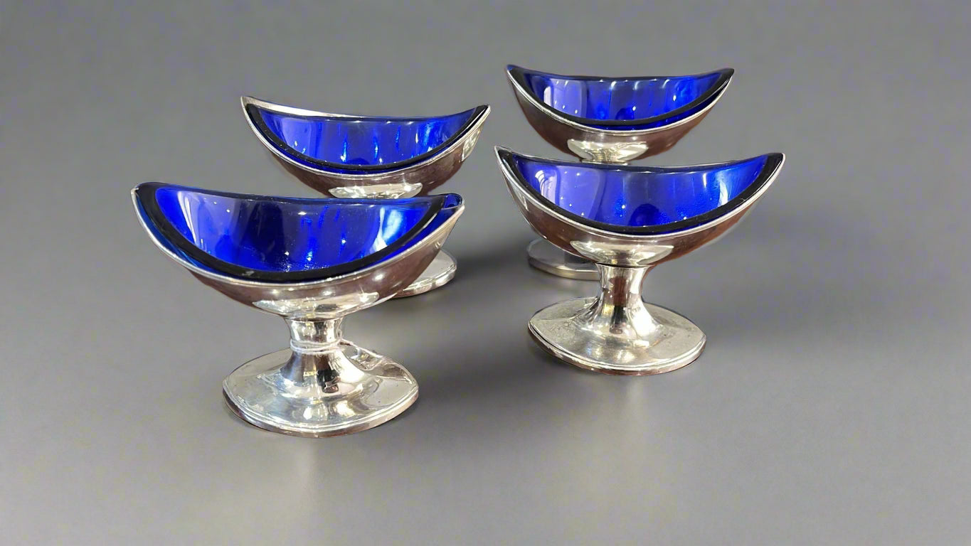 set of four silver salts with blue glass liner