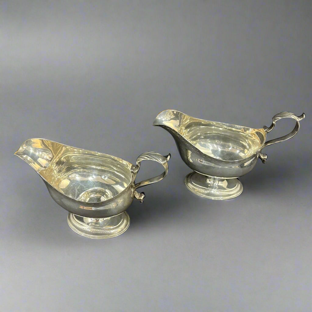 A pair of George III silver sauce boats circa 1780 by William Skeen