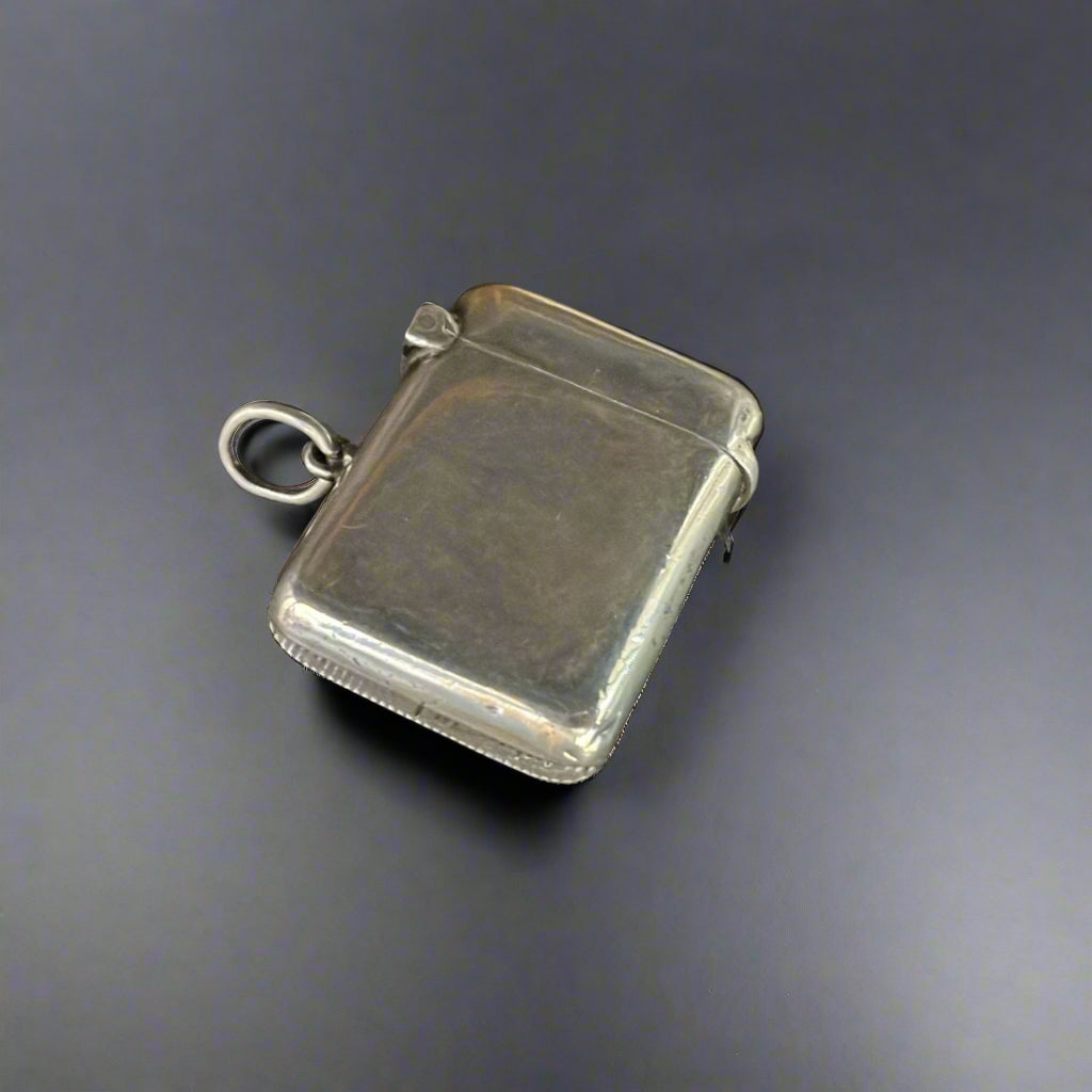 small antique silver vesta