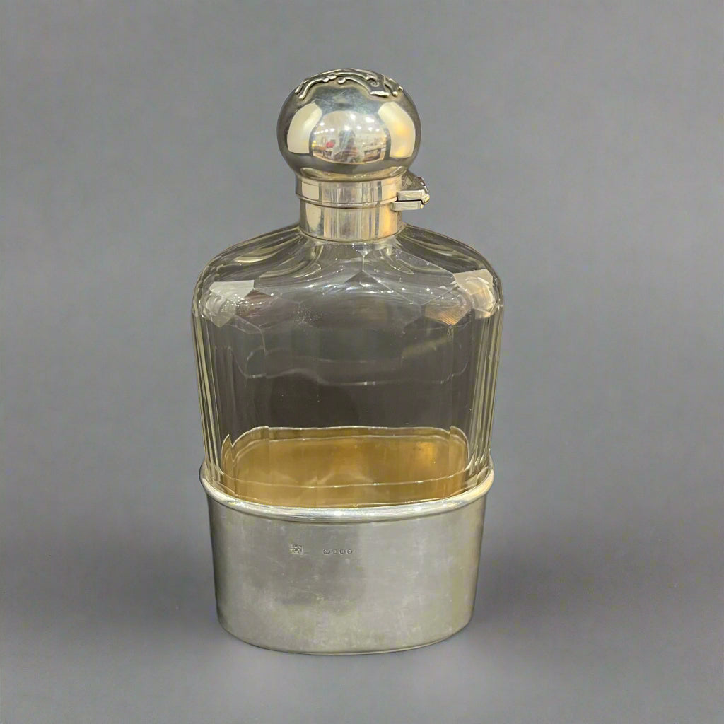 Glass spirit flask with silver gilt cup  London 1883 by Asprey