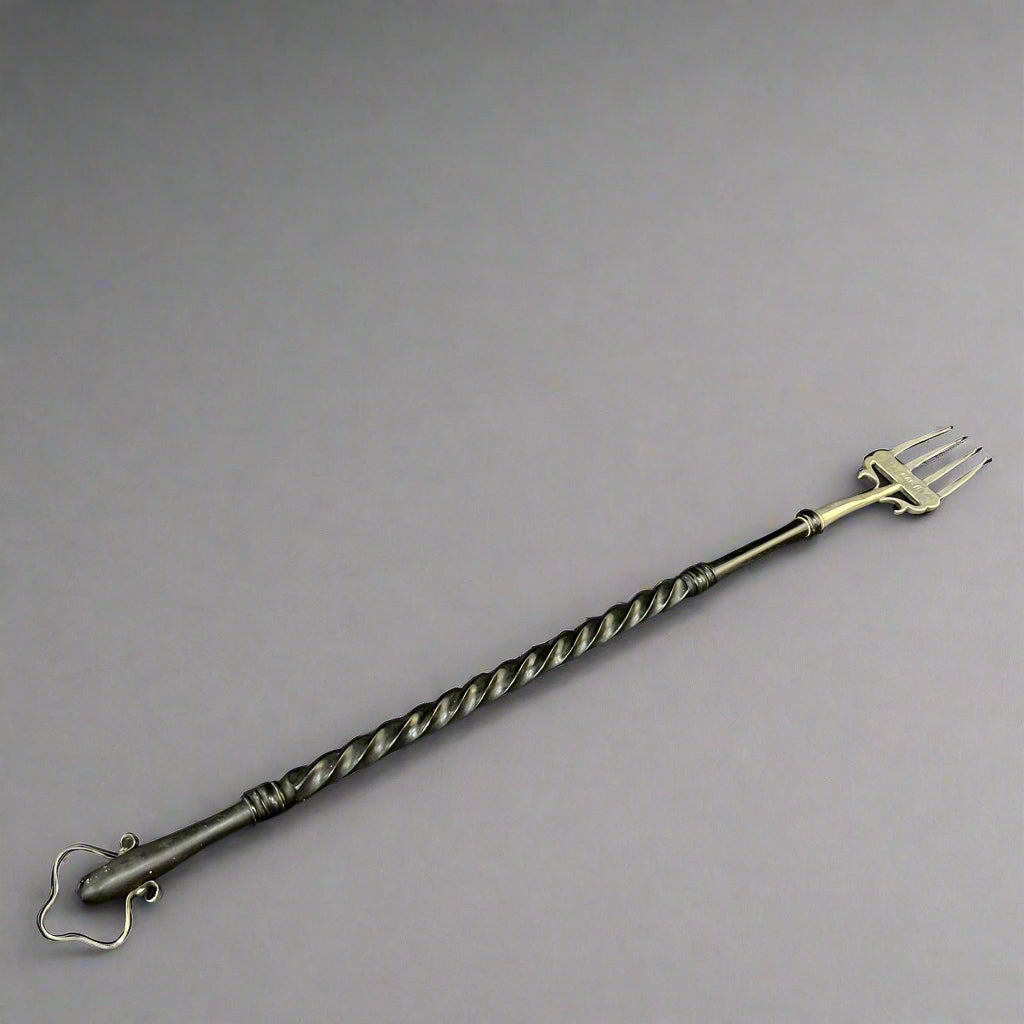 Silver toasting fork made in Chester 1909