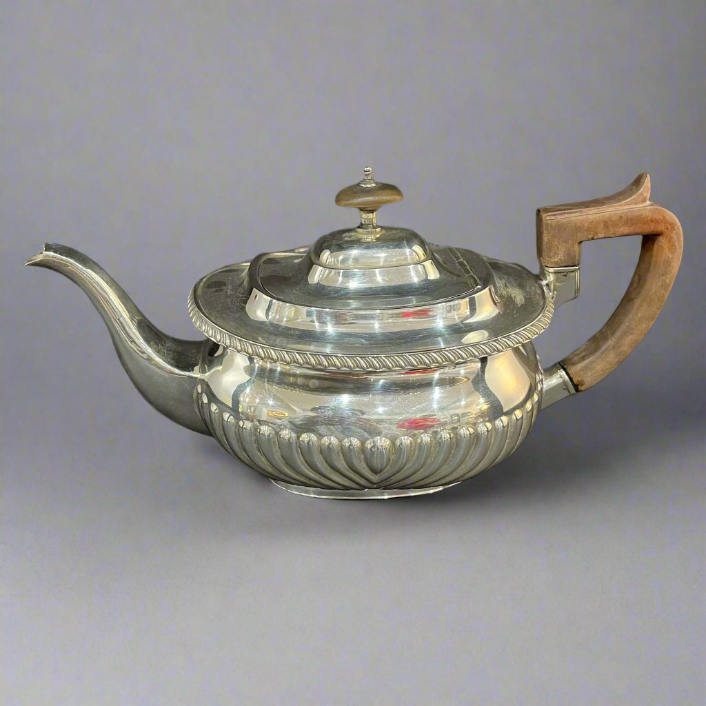 Half fluted silver teapot London 1912