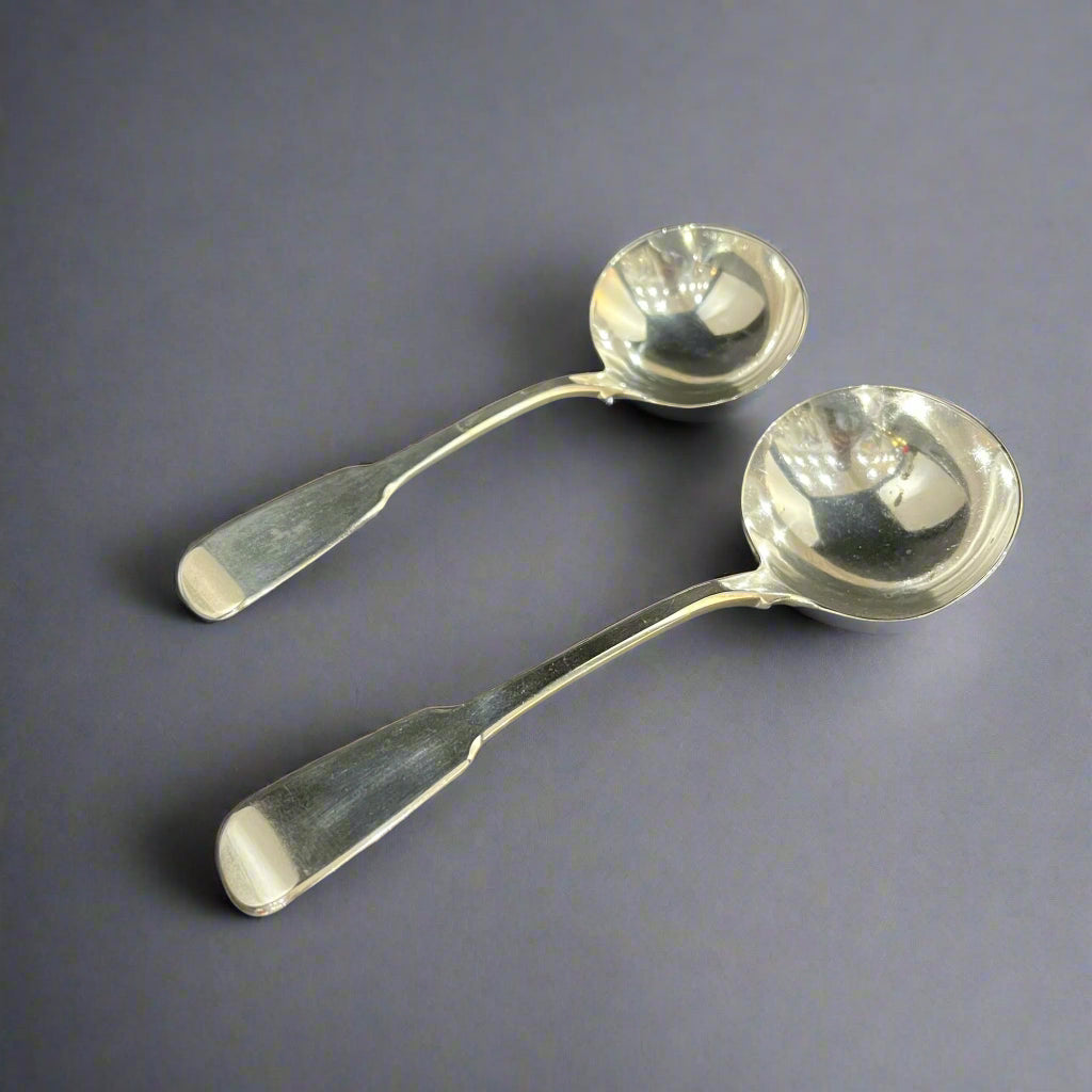 Pair of silver fiddle pattern sauce ladles London 1821