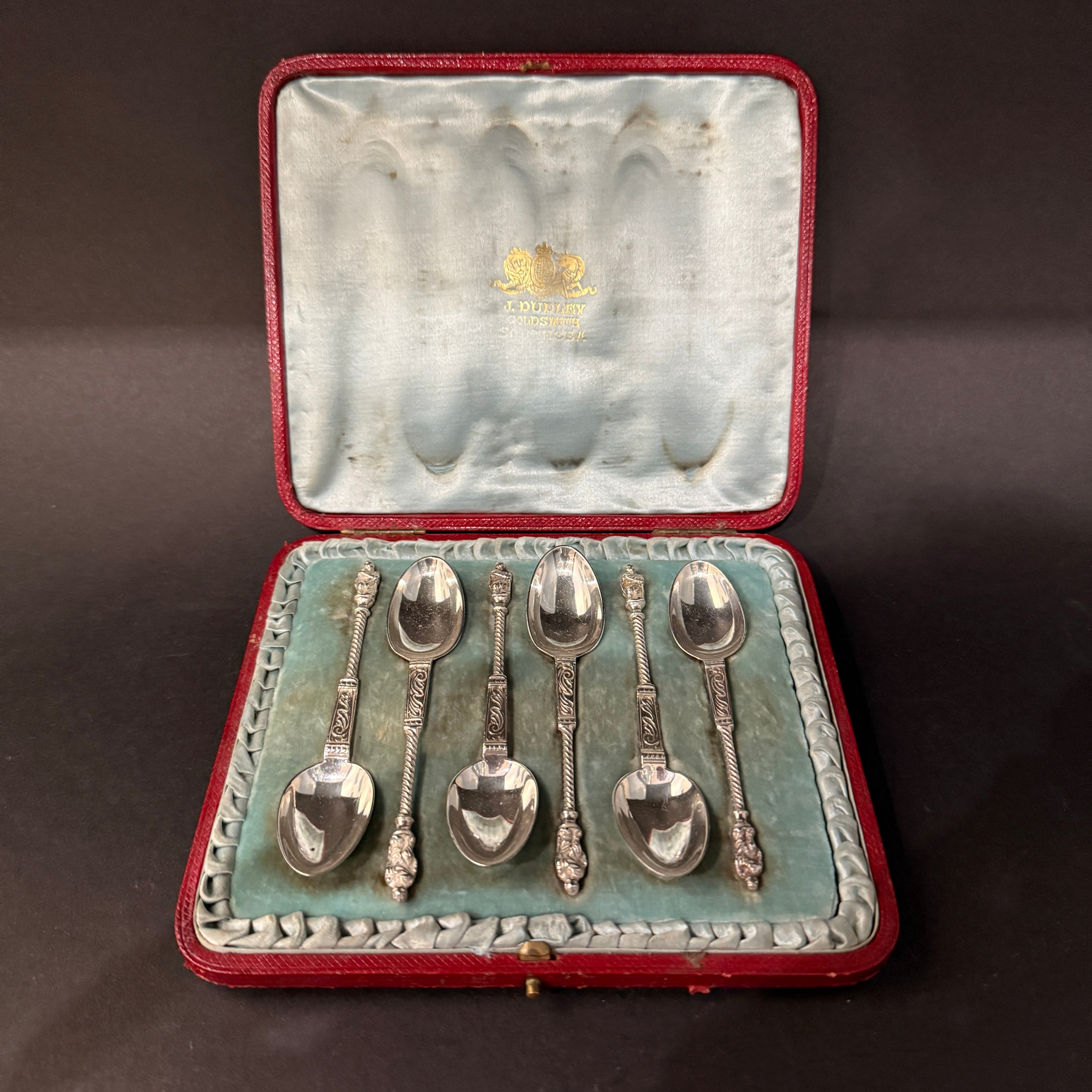 Set of six silver teaspoons with silver spiral shaft and figure on top made in London 1897