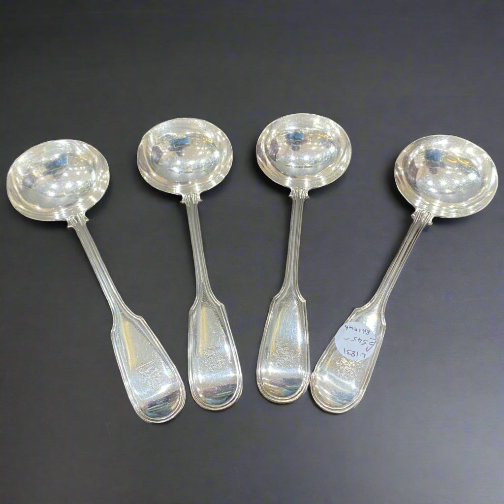 set of four silver sauce ladles