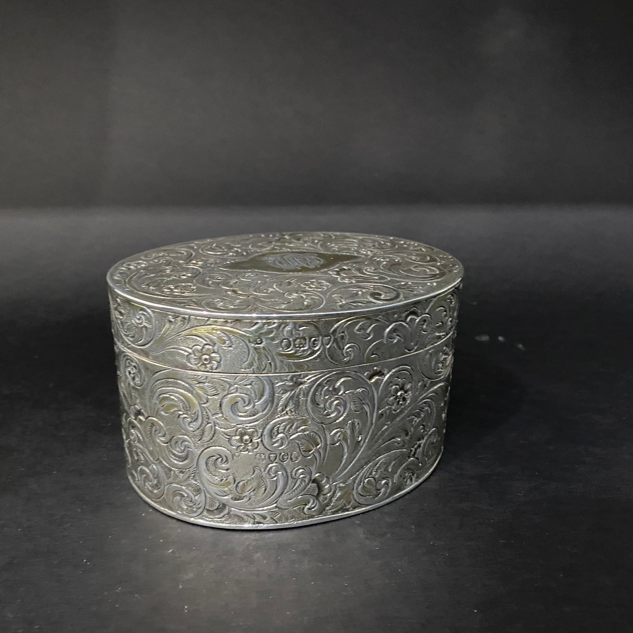 silver tea caddy with gilt interior